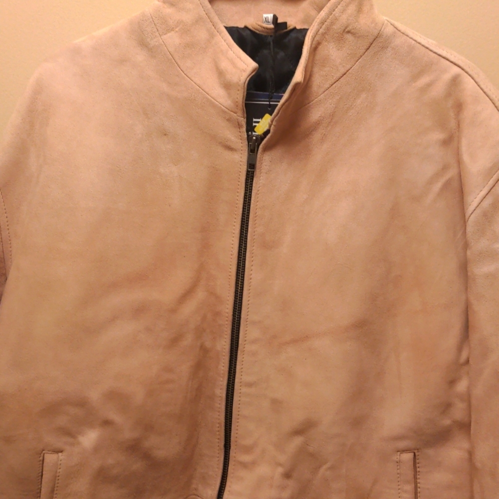 New mens suede jacket. Buttery soft. 2 front pockets. Fully lined.